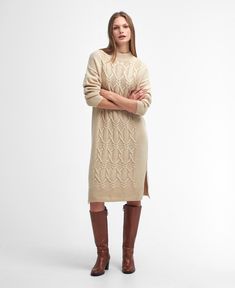 Elisha Cable-Knit Midi Dress The Barbour Elisha Knitted Dress delivers cosy warmth from the ribbed high-neck right down to the knee thanks to its wool-rich yarns and long sleeves. Boasting a classic cable-knit design for a true winter-ready look, it looks particularly stylish when paired with knee-high boots. Cable Knit Dress, Roll Neck Sweater, Chunky Wool, Long Sleeve Sweater Dress, Knitted Dress, Knit Midi, Weekend Wear, Knit Midi Dress, Knitted Jumper