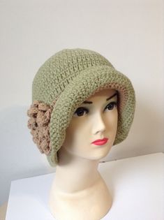 These beautiful crochet womens hats are great for every girl or woman. Handmade crocheted using acrylic yarn. Decorated by soft detachable brown flower. This green cloche hat fit most women and older teens. I'll be happy to help you. Care instruction: Hand wash and lay flat to dry. This Hat was made in non-smoking and pet-free home. ** shipment within 24hours after purchase, weekend 48 hours via post office... SHIPPING I ship with in the two days of order, after payment is received. I send all o Green Crochet Hat With Short Brim For Winter, Brown Crochet Knitted Hat For Spring, Green Short Brim Crochet Hat For Winter, Trendy Handmade Green Crochet Hat, Green Crochet Hat Made Of Yarn, Warm Green Brimmed Hat, Green Warm Brimmed Hat, Handmade Green Crochet Hat For Winter, Green Hand Knitted Crochet Hat