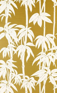 an image of a wallpaper with white bamboo trees on gold foiled paper in the background