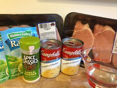 some food items are sitting on a wooden table and ready to be put into the oven