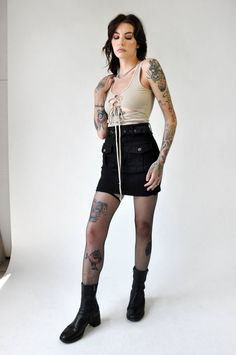 Sullen Lace Up Tank Underbust Corset Belt With Lace-up Back, Underbust Lace-up Back Corset Belt, Edgy Fitted High Waist Crop Top, Chic Cross-tied Crop Top For Night Out, Edgy Fitted High-waist Crop Top, Spring Underbust Crop Top For Night Out, Edgy High Waist Fitted Crop Top, Spring Crop Top With Corset Back And Tank Straps, Spring Festival Corset Belt