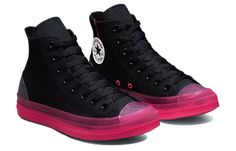 The iconic Converse Chuck Taylor All Star sneaker never goes out of style. Reimagined in modern ‘Black Hyper Pink’, the CX High version is the perfect way to keep up with current trends while maintaining a timeless classic look. The stretch canvas upper ensures a comfortable fit and the black color creates an on-trend, versatile shoe that can be easily added to any outfit. The bright pink webbing pull loop at the heel and white leather All Star patch add pops of color for a subtle touch of style Zapatillas All Star, Converse Hightop, Goth Shoes, All Star Shoes, New Converse, Current Trends, Korean Street, Round Toe Heels