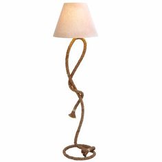 a lamp with a rope on it and a white light bulb in the middle of it