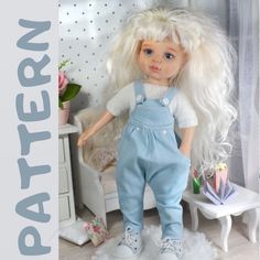 a doll with blonde hair and blue overalls standing in front of a white chair