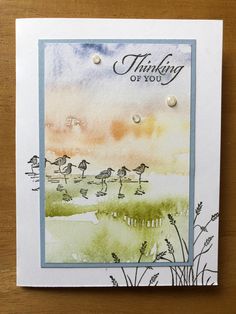 a card with some watercolors on it and the words thinking is you written in white