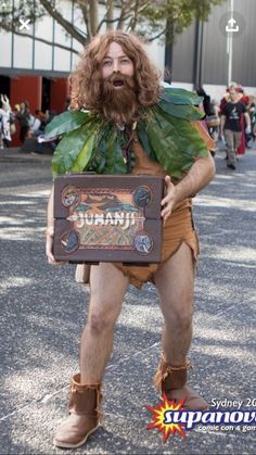 a man dressed in costume holding a sign