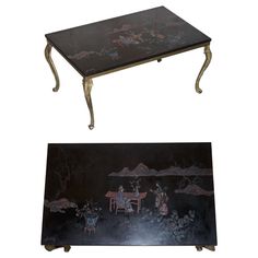 two tables with paintings on them, one is black and the other has gold trimmings