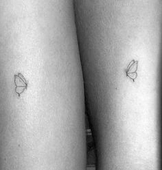 two small butterflies on the thighs