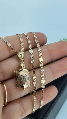 Turtle chain set in 14k gold chain measures 22 in long and pendant measures 21mm tall. This item is ideal for women gift box included  Cadena con tortuga en oro de 14k mide 22 pulgadas de largo y el colgante mide 21 mm de alto. Este artículo es ideal para mujeres. Caja de regalo incluida. Turtle Necklace, Turtle Pendant, Pendant Necklaces, Gold Chain, Necklace Set, Jewelry Necklace Pendant, Gift Box, Jewelry Necklaces, Angeles