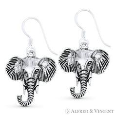 The featured earrings are cast in .925 sterling silver and showcase oxidized-finish elephant head charms finished with hook posts for an easy fit. Your purchase include a 30-Day Exchange or Money-Back Guarantee & Free US Shipping. Please email us for more information regarding this listing. Size: one size.  Color: Metal Type.  Gender: unisex.  Age Group: adult. Elephant Pictures, Baby Elephants, Mickey Mouse Earrings, Elephant Earrings, Elephant Head, Bird Earrings, Charm Rings, Womens Wedding Bands, 925 Sterling Silver Earrings