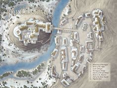 an aerial view of a town and its surrounding water source in the middle of a desert