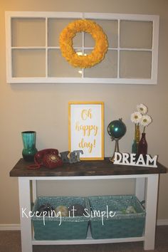 a shelf with some items on it in front of a sign that says oh happy day