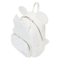 Yoohoo! Say, “I do!” Our Loungefly Disney Iridescent Wedding Mini Backpack is ready for a special day. This pearly white accessory, with iridescent details, makes an elegant and fun addition to a festive occasion. The front pocket takes on a quilted effect, with tiny pearlized Disney’s Mickey Mouse ear decorations at the diamond points in the quilt design. Above, a white applique bow can be changed up with or without the tulle fabric. The tulle fabric also includes delicate silver dots of “confe White Disney Backpack For School, Disney White Backpack For School, Mini Disney Backpacks, Disney Loungefly Backpack Cinderella, Loungefly Disney Backpack Minnie, Frozen Loungefly, Disney Mini Backpack Target, Iridescent Wedding, Iridescent Material