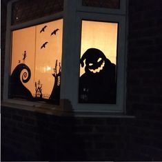 an image of a window decorated with halloween decorations