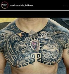 a man with tattoos on his chest and chest