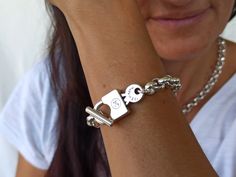 Chunky Key and Lock bracelet. Perfect as a gift of just to treat yourself. This bracelet is made with 10mm sterling silver plated brass rolo chain and sterling silver plated zamak key and lock toggle closure. Chain link size: 10mm Padlock size: 36x17mm Sterling silver plated Zamak is a great alternative to solid sterling silver for the budget conscious buyer, it is just as pretty and durable and it is stain less. Brass is immersed into pure silver so that it contains sterling silver. All silver Lock And Key Jewelry, Leather Silver Bracelet, Chunky Silver Jewellery, Chunky Silver Bracelet, Key And Lock, Lock Bracelet, Toggle Clasp Bracelet, Silver Heart Bracelet, Key Pendant Necklace