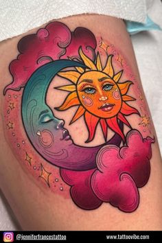 a sun and moon tattoo on the thigh