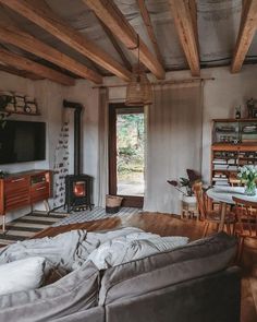 a living room filled with furniture and a fire place