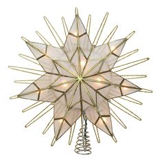 a lighted star decoration on a white background