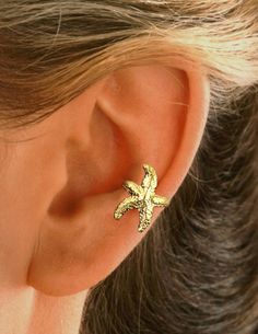 "Ear Charms® Fun Starfish Ear Cuff Non-Pierced Side Cartilage Non-pierced Earring Crawler - Reminiscent of the Seaside & Reminds Us of Summer.  Solid Sterling Silver 925 Starfish, Also available in Yellow Gold or White Rhodium over the Sterling  Silver for a Carefree Finish.  Fully Adjustable, Comfortable & Secure Carry or Gift Box to keep them in & Simple Instructions Included.  Ear Charms® Inc. 1982 - 2021 / Sandra Callisto designer (Hand carved & cast using the \"Lost Wax Method\".)   Wear a Adjustable Summer Ear Cuff As Gift, Summer Star-shaped Jewelry For Pierced Ears, Gold Star Earrings For Summer, Jewelry Beautiful, Climber Earrings, Dope Jewelry, Funky Jewelry