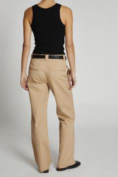 Elevate your everyday style with the Nessa Khaki Pant, the epitome of comfort and sophistication. Designed with a low to mid rise for a flattering fit, these pants boast an ultra-soft feel that ensures all-day comfort. The sleek hook and bar closure adds a touch of refinement, while the raw hem brings a modern edge to the classic khaki design. Signature wide belt loops allow for effortless accessorizing, making these pants a versatile addition to any wardrobe. Whether you're dressing them up wit Straight Leg Pant, Wide Belt, Monogram Logo, Everyday Style, Embroidery Logo, Straight Leg Pants, Everyday Fashion, Khaki Pants, Mid Rise