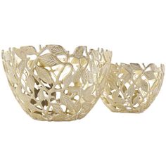 two gold metal bowls with leaves on them