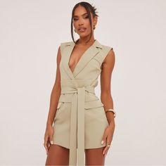 Get That Office Siren Look With This Dress. Featuring A Green Woven Material, A Sleeveless Design, A Belted Waist, A Tailored Design And A Mini Length. Chic Sleeveless Dress For Spring, Chic Sleeveless Vest Dress For Spring, Chic Spring Dress With Vest Detail, Sleeveless Mini Dress For Summer Workwear, Fitted Belted Sleeveless Summer Dress, Sleeveless Belted Party Dress, Spring Fitted Belted Sleeveless Dress, Fitted Belted Sleeveless Dress For Spring, Chic Belted Sleeveless Dress