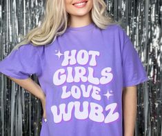 "Hot Girls Love Wubs" Shirt - Music Festival Shirt Women's, Rave Outfit Join the Secret Wook Society with our "Hot Girls Love Wubs" shirt, designed for all the hot girls who live for the wubs and drops of riddim and dubstep music. Perfect for music festivals, raves, or just showing off your love for the EDM scene, this tee is a must-have for any dubstep queen. Crafted from high-quality Comfort Colors 1717, this shirt offers ultimate comfort and a trendy fit. Whether you're dancing under the star Rave Tshirt, Dubstep Music, Rave Shirts, Festival Shirt, Trendy Fits, Rave Outfit, Festival Shirts, Music Festivals, Dubstep