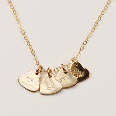 This delicate Minima heart-shaped necklace is a subtle yet bold expression of love. Minima hearts are tiny and precious, yet still make the biggest impact whenever they're worn. Wear it alone, or create your own personal necklace by stacking up with more heart charms and initials. Product Details: Material: 14k Gold Filled, Sterling silver, Rose gold filled 0.3" heart charm Production Time: Your pieces are handmade with care and love; they also take time to produce. Please allow 8- 12 business d Everyday Initial Pendant Necklace With Heart Charm, Dainty Everyday Heart Charm Necklace, Minimalist Charm Necklace With Heart Charm For Personalized Gift, Minimalist Heart Charm Necklace For Personalized Gift, Minimalist Personalized Heart Pendant Charm Necklaces, Minimalist Personalized Heart Pendant Charm Necklace, Personalized Dainty Heart Pendant Charm Necklace, Dainty Personalized Heart Pendant Charm Necklace, Minimalist Heart Pendant Necklace With Charms