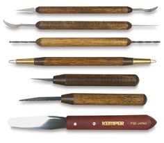 seven different types of knifes with wooden handles