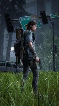 the last of us character standing in tall grass near street sign and traffic light, looking at camera