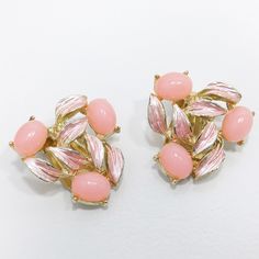 "*Description: This is a beautiful pair of vintage Judy Lee pink Lucite & enamel clip earrings from the 1950s. This pair of earrings is highlighted in Julia C. Carroll's book Costume Jewelry 101 where she explains, \"these earrings feature creamy pink oval cabochons and shimmering pink enamel over gold leaves.\" Each earring has three pink Lucite cabochons with pink enamel painted leaves. They would make a great addition to your vintage jewelry collection and also make a great gift. *Approxi Jewelry 101, Book Costumes, Book Pieces, Costume Jewelry Earrings, Gold Leaves, Painted Leaves, Pink Enamel, Clip Earrings, 1950s Vintage