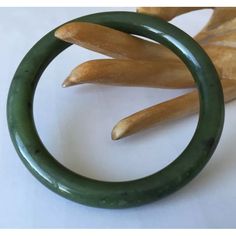 Inventory Id: 796 Antique Burma Jade/Jadeite Bangle Bracelet -- Piece Is Deep Bright Green Jadite --Hand Carved In Tokyo Area Of Japan -- Between 1870 And 1920 New-Old-Stock Measurements 75.43 Mm Total Diameter 60.30 Mm Across The Center Opening 7.17 Mm Total Thickness This Piece Is Natural, Untreated, Unprocessed, Undyed And Unenhanced Jade / Jadeite Green Classic Bangle For Formal Occasions, Elegant Green Round Bangle, Elegant Jade Round Bangle, Classic Green Round Bangle, Bright Green, Bangle Bracelet, Womens Jewelry Bracelets, Antique Jewelry, Bangle Bracelets