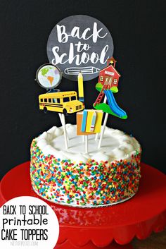 back to school cake topper with colorful sprinkles on red plate and black background