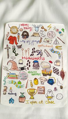 a white pillow with various items drawn on it