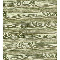 a green rug with wood grains on it