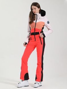 Gsou Snow Retro One-piece Ski Suit is As Cool As It Is Technical: Done In A 15k Waterproof Shell Fabric, It Has A Fitted Silhouette and A Zip-front Detail With A Belted Waist for Added Definition. It Looks Particularly Sporty On The Slopes Thanks To The Color-blocked. Nave Blue, Red, Black, White, 4 Color to Choose. Jumpsuit Chic, Ski Fashion, Ski Suit, Ski Suits, Ykk Zipper, One Piece For Women, Fitted Silhouette, Fur Trim, Waist Belt