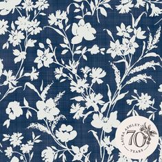 a blue and white floral pattern with the number seventy on it's center piece