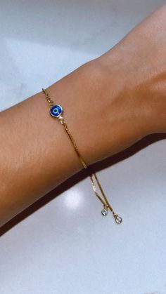 "These dainty, handmade beautiful Evil Eye bracelets are the perfect gift for yourself or a loved one. They are a simplistic, classy design you won't find anywhere else. Each bracelet is handmade and durable enough for everyday wear. ☉ Bracelet Size: The rhinestone detailed Adjustable Bracelets are about 1mm thick, 120~126mm long. The extender adjuster makes the bracelet suitable for all sizes. They are easy to put on and take off and stay in place once adjusted. The Evil eye charm size is 6.5x1 Dainty Adjustable Chain Bracelet As Gift For Her, Gold Evil Eye Bracelet With Adjustable Length As Gift, Simple Adjustable Chain Bracelet Gift, Simple Adjustable Jewelry As A Gift, Dainty Handmade Anklets For Gift, Dainty Handmade Anklets As Gift, Dainty Handmade Anklets For Gifts, Gold Hypoallergenic Friendship Bracelet, Handmade Dainty Anklets As Gift