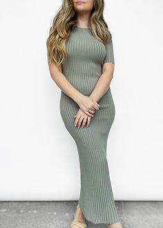 Subtle yet bold - this short sleeve fitted knit midi dress is a staple for the spring season. Featuring a high boat neck, stretch ribbed knit, and 1/4 sleeves. Can be dressed up or down with either sneakers and a denim jacket, or heels and a leather jacket! Model is 5'3" and wears the size 4. Materials: 65% viscose, 35% nylon. Designed in Australia. *SALE ITEMS ARE FINAL SALE & CANNOT BE RETURNED* Return Policy