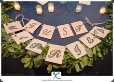 a table with candles and signs on it