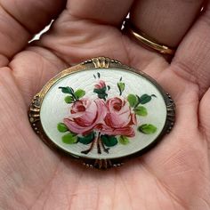 Guilloche Enamel Pink Rose Sterling Silver 925 Marked Oval Brooch / Pin.  Marked  and 925S. Circa 1950's.  Approximately 1.75 inches across. Very good vintage condition. Amazing Mother's Day, Easter, Valentine's Day, Christmas, Birthday gift for that special someone. Contact me for a Canada Post rate. Vintage Enamel Jewelry For Anniversary, Vintage Flower Jewelry Collectible, Vintage Flower Jewelry For Collectors, Vintage Collectible Flower Jewelry, Vintage Collectible Enamel Pin, Handmade Vintage Enamel Pin, Vintage Enamel Brooches For Anniversary, Vintage Oval Jewelry With Rose Design, Handmade Vintage Brooch For Anniversary