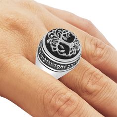 "An Insignia-Style Black Onyx, Hebrew Biblical Verse and Tree of Life Jewish Ring made of 925 Sterling Silver. The face of the ring houses a silver Tree of Life symbol - which alludes to the interconnection of all life on our planet, it was mentioned several times in the Bible and Kabbalah in the context of medicine and eternal life, which began in the biblical story of Adam and Eve. The inscription on the ring depicts the Hebrew biblical verse: \"Surely your goodness and love will follow me all Tree Of Life Symbol, Judaica Jewelry, Triple Hoop Earrings, Silver Tree, Circle Earrings, Star Necklace, Tree Of Life, Black Onyx, Photo Jewelry