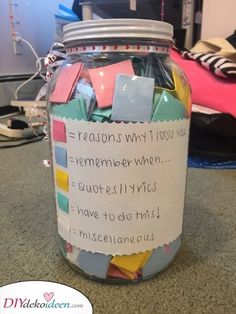 a jar filled with lots of sticky notes