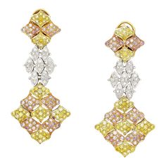 7.50 Carats Tricolor Diamond Drop Earrings in 18K White, Yellow & Rose Gold. Mounted with pave set natural pink, white, and yellow diamonds that correspond with each gold tone.   Details:  Item Type: Earrings Metal: 18K White Yellow Rose Gold Weight: 21.31 Grams  Stone Details: Yellow Diamond: 56pcs Round-Cut Pink Diamond: 126 Round-Cut White Diamond: 108 Round-Cut Carat:7.50 CTTW  These exquisite earrings are a stunning testament to luxury and craftsmanship. Set in 18K white, yellow, and rose gold, they weigh 21.31 grams and feature a mesmerizing blend of diamonds. With 56 round-cut yellow diamonds, 126 round-cut pink diamonds, and 108 round-cut white diamonds, totaling 7.50 carats, these earrings offer a vibrant and elegant touch to any outfit. Perfect for those who appreciate bold, soph Sophisticated Jewelry, Yellow Diamonds, Pink Diamonds, Nature Earrings, Earrings Metal, Moonstone Earrings, Diamond Drop Earrings, Diamond Drops, Gold Earrings Dangle