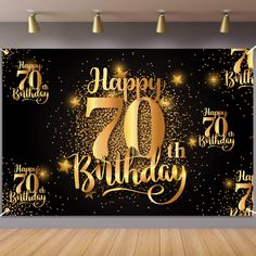 a black and gold birthday backdrop with the number seventy