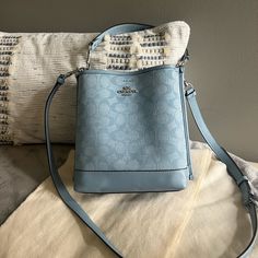 Super Fun Coach Mollie Bucket Bag 22-Chambray Signature Fabric And Cornflower Blue Leather Multi Ch230 Only Used One Time Non Smoking/Non Pet Home See Pics For Measurements Authentic Coach-Has Interior Coach Stamp With Coach Assigned Number Silver Coach Accents 2 Handles (1 Is 44 Inch Leather-It Has 7 Hole Adjustments W Silver Buckle) (1 Is 14 Inches Long, Leather As Well) This Is A Super Cute Purse. I Just Didn’t Prefer The Size. In Exceptional Condition This Item Does Nit Have Original Tag On Coach Mollie Bucket Bag, Coach Mollie, Cute Purse, Bags Coach, Cute Purses, Pet Home, Cornflower Blue, Blue Leather, Coach Bags