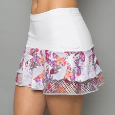 Tennis Clothes / Designer ActivewearDesigned and made in USA!DESCRIPTIONFashion forward skort with textured mesh sheer panel details, flattering fit. DETAILS & FITSlightly loose fit. Skort Length: XS: 12.5" S:13 " M: 13.5" L: 14" XL: 14.4"FABRIC & CARE88% Nylon / 12% SpandexMachine wash cold, do not bleach, tumble dry low, cool iron, do not dry clean. Fitted White Mesh Bottoms, White Fitted Mesh Bottoms, White Mesh Bottoms, White Mesh Bottoms For Summer, White Mesh Sports Bottoms, Spring Bottoms With Built-in Shorts And Mesh Material, Spring Mesh Bottoms With Built-in Shorts, White Mesh Sporty Bottoms, White Mesh Casual Bottoms