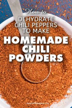 homemade chili powder in a white bowl with a spoon on top and the words how to dehydraate chili peppers to make homemade chili powder