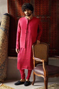 Cherry red straight kurta with all-over printed motifs. Comes with Nehru jacket enhanced with placement resham-dabka work and churidar.
Component: 3
Embroidered, Printed
Neckline: Mandarin Collar
Sleeve Length: Bundi: Sleeveless
Fabric: Tusser Silk, Satin Silk
Color: Red
Welt pocket
Closure: Bundi: Front buttons - Aza Fashions Punit Balana, Red Kurta, Kurta Set For Men, Silk Kurta, New Address, Nehru Jackets, Jumpsuit Skirt, Indian Fashion Designers, Satin Silk